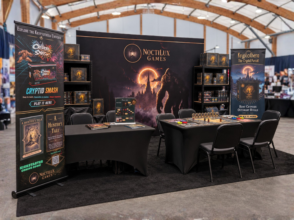NoctiLux Games exhibition stand at Canterbury Games Con 2026, featuring Kryptothera: The Cryptid Pursuit, game displays, demo tables and the wider Kryptothera range and NoctiLux Games illustrated books.