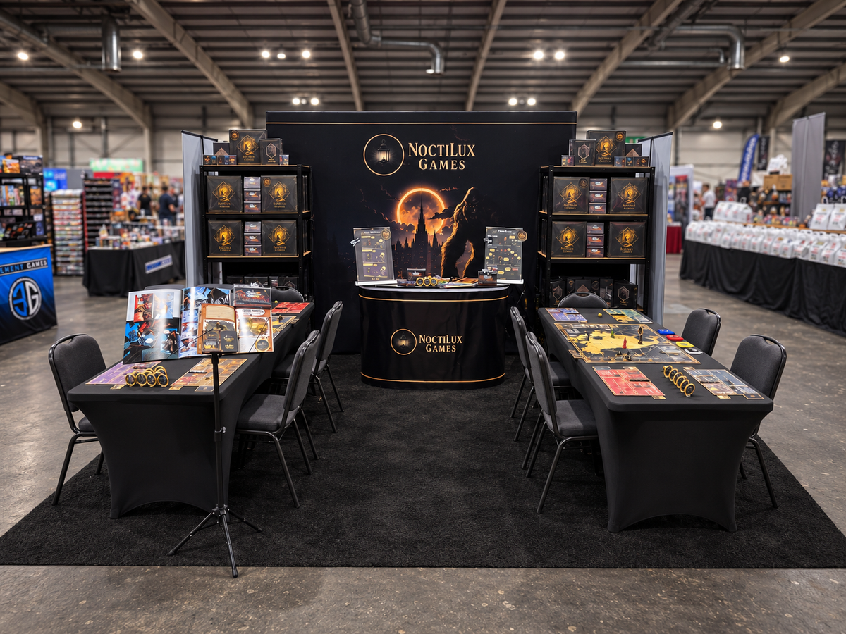 NoctiLux Games exhibition stand at Tabletop Scotland 2026, featuring Kryptothera: The Cryptid Pursuit, game displays, demo tables and the wider Kryptothera range and NoctiLux Games illustrated books.